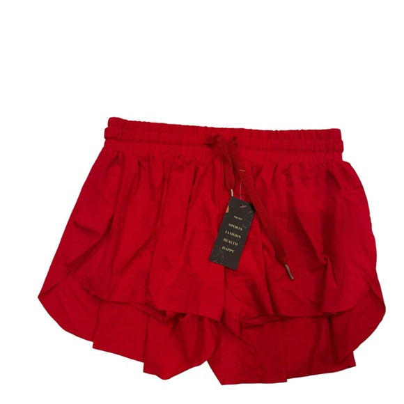 Girls red flutter shorts with compression shorts with built in pocket - Picture 1 of 5